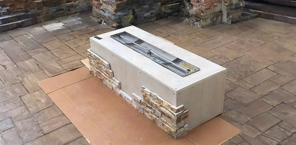 What is a Fire Pit Enclosure Kit?