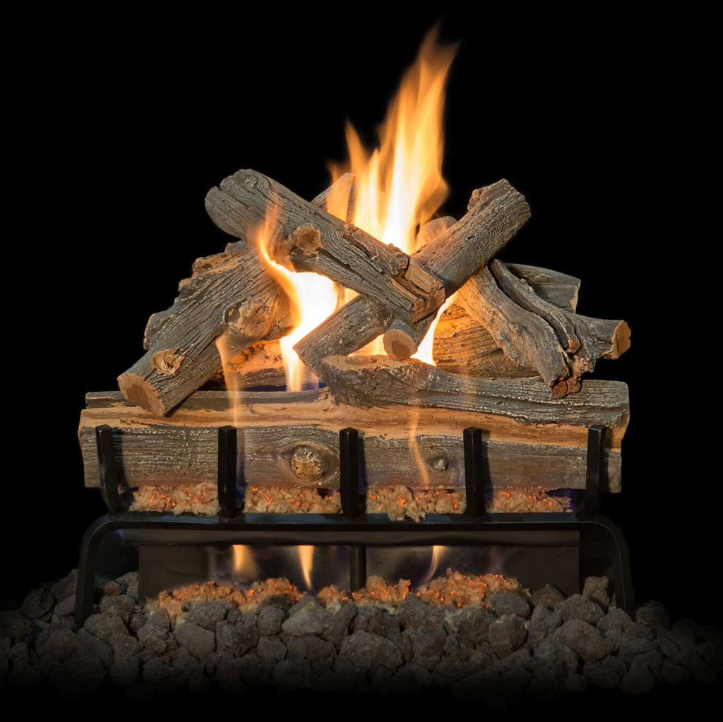 Vented gas log set with gray logs, stainless burner grate, and bright orange flames