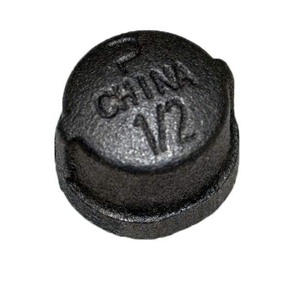 Black iron pipe cap with raised lettering and circular end cap design
