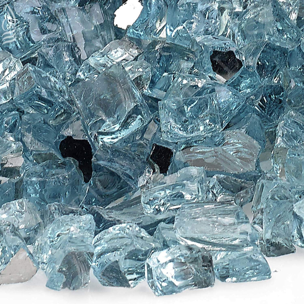 Blue glass fire media close-up, reflective faceted fragments