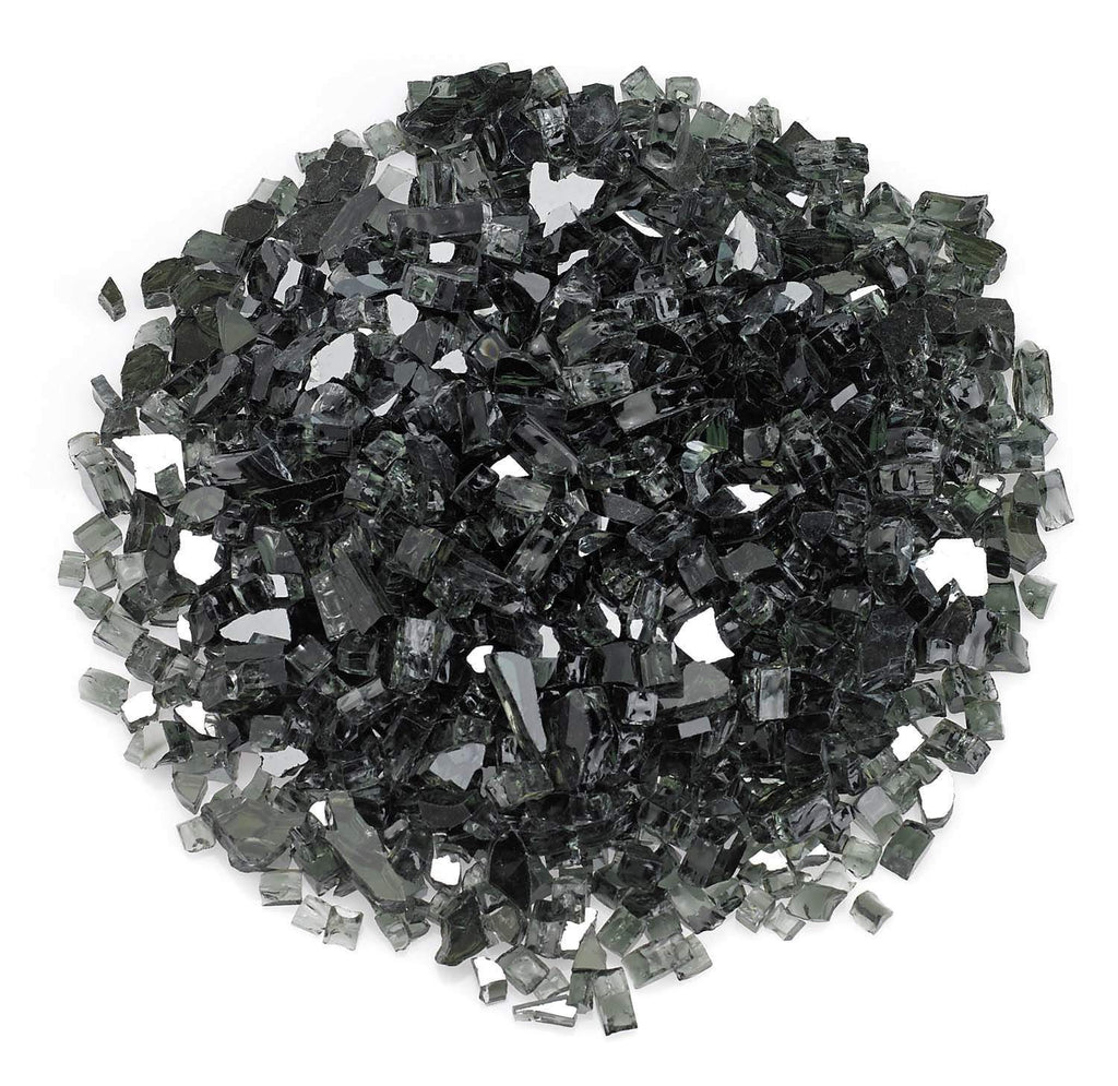 Black reflective fire glass shards, small cut pieces piled together.