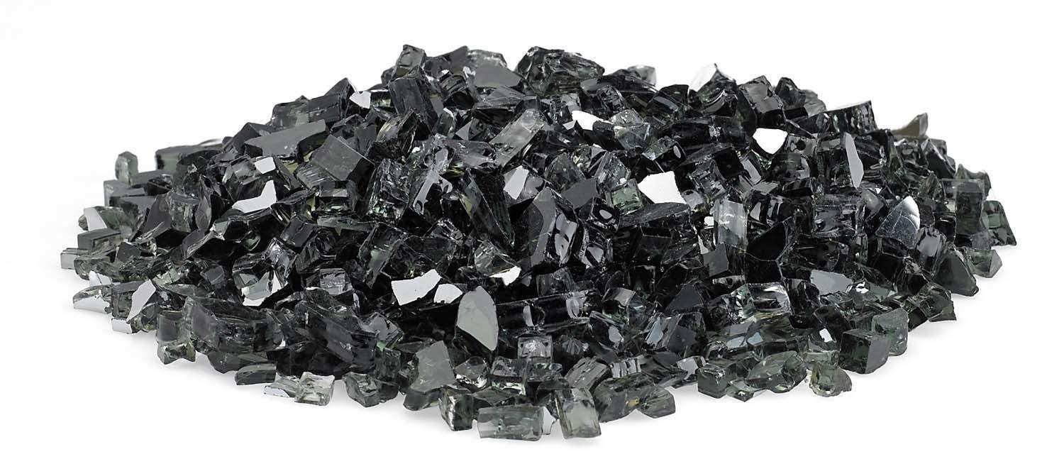 Black reflective fire glass shards, mixed pieces in a spread pile.