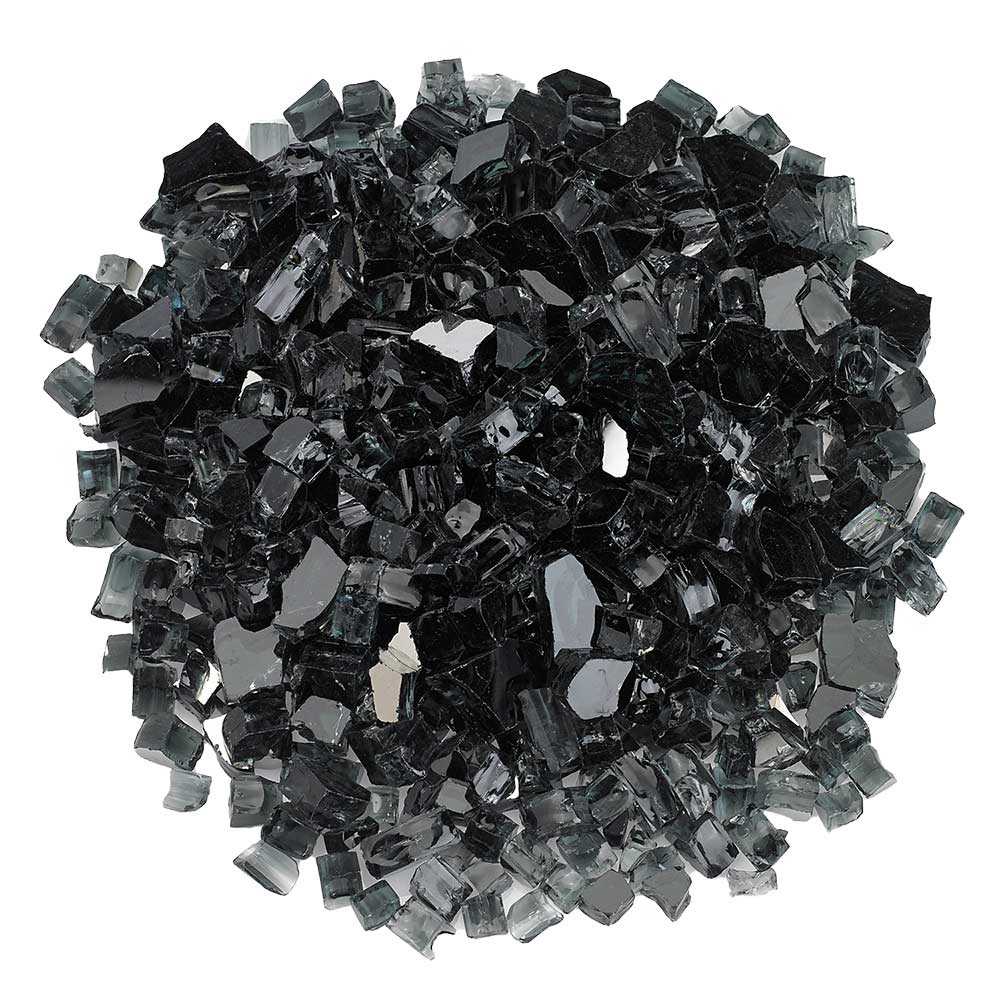 Black reflective fire glass chunks, small faceted pieces piled
