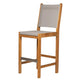 Teak bar sling chair with white fabric backrest and cushioned seat.