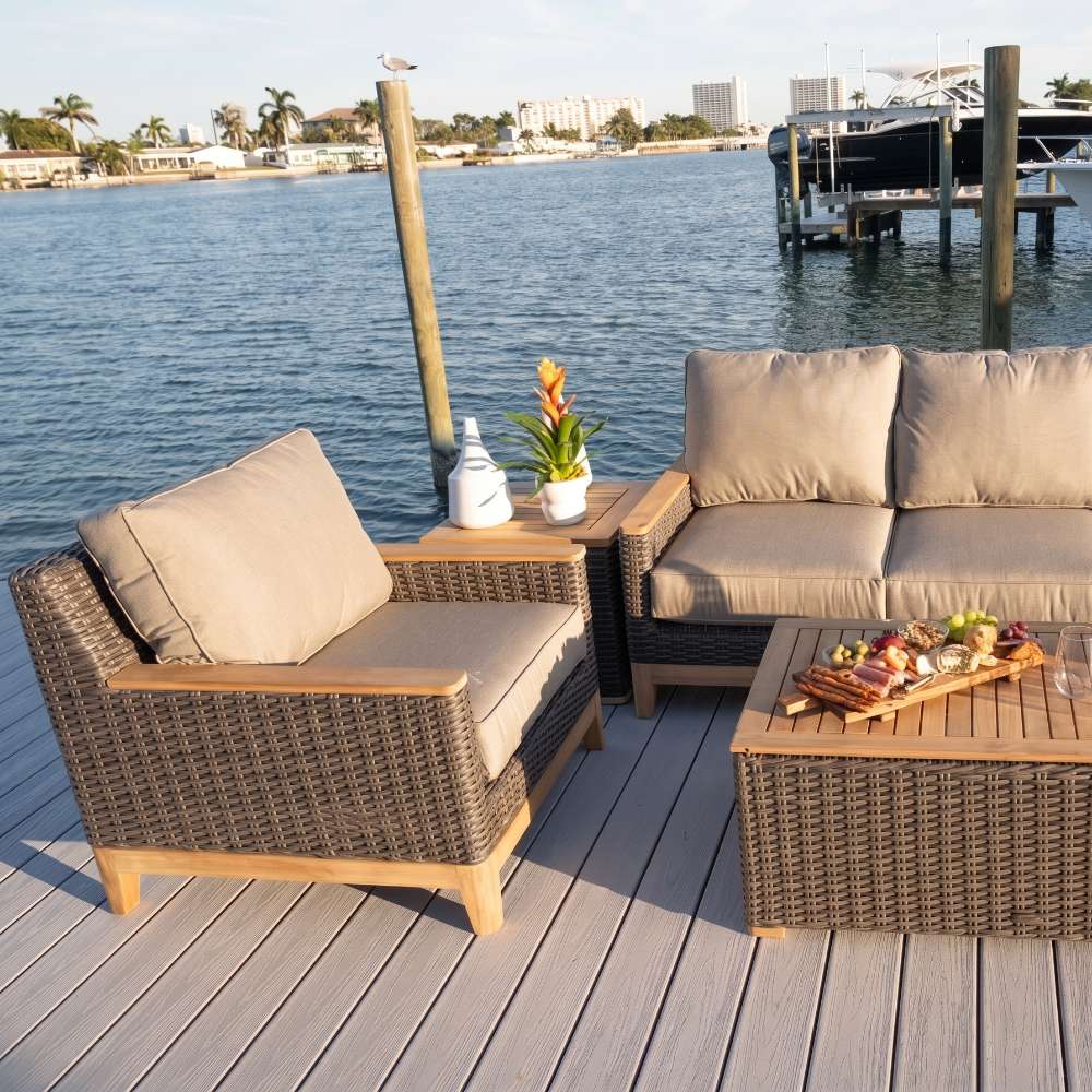 Woven lounge chair with dark wicker arms, beige cushions, and light wood frame