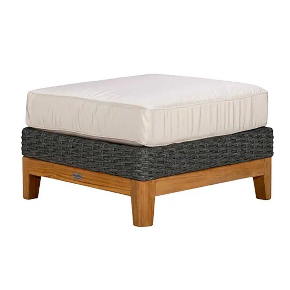 Boca outdoor ottoman with light cushion, charcoal woven base, and honey wood legs