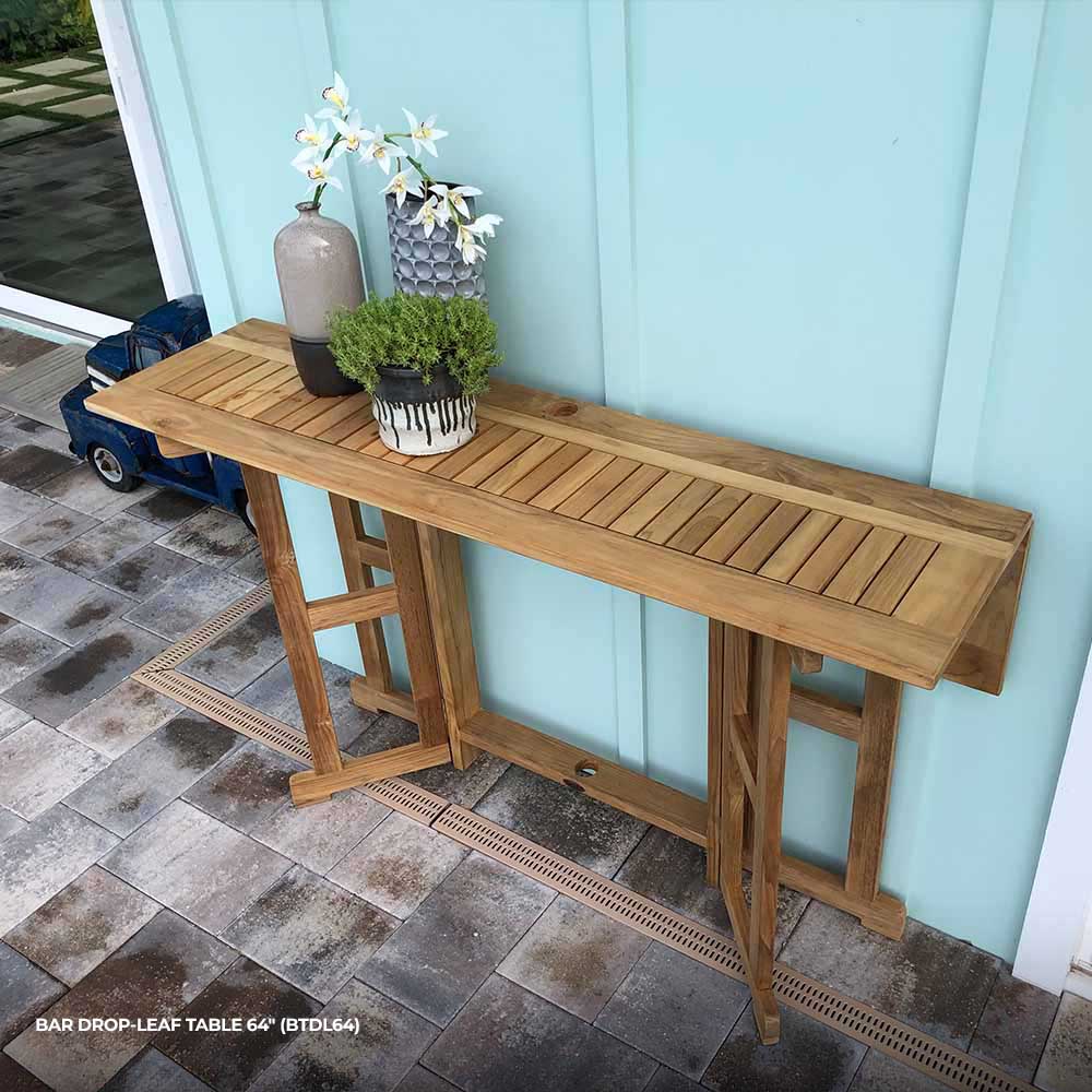 Rectangular teak bar table with slatted top and drop-leaf panel, natural brown wood.