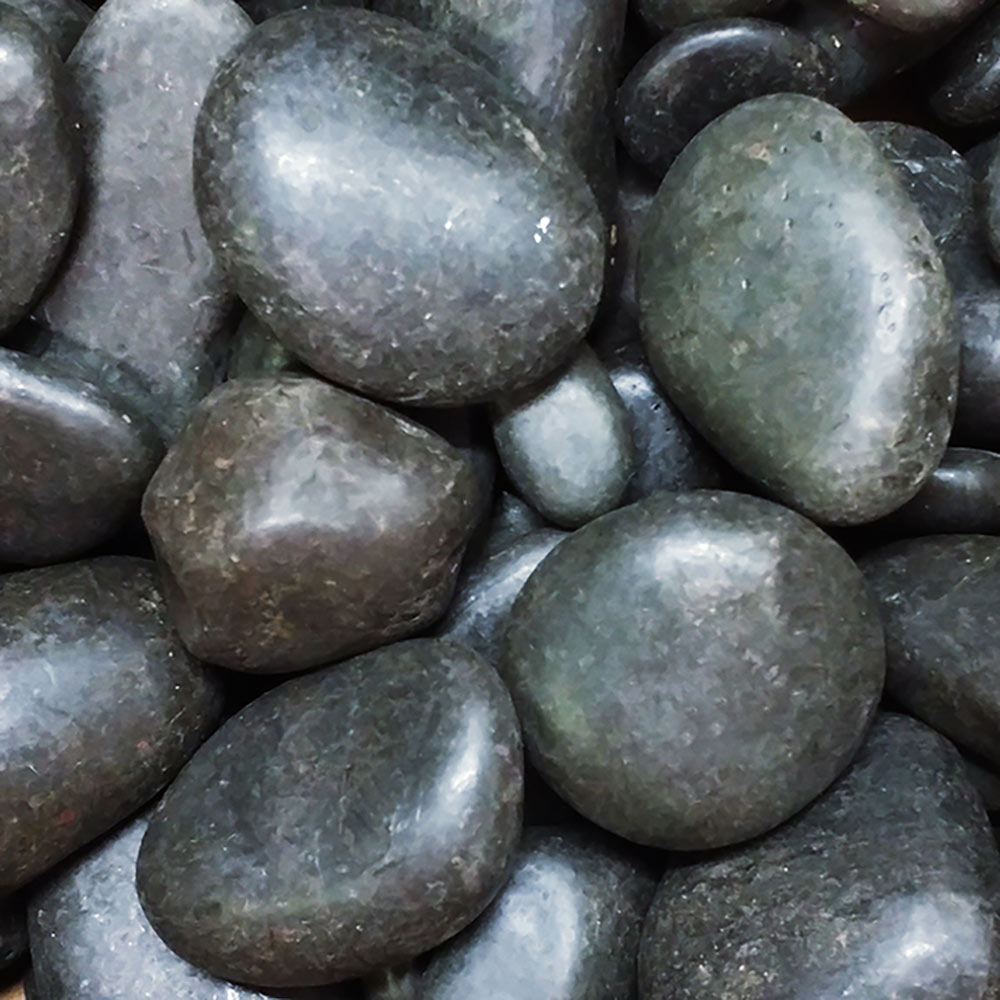 Gray river stones, smooth oval shapes for fireplace media