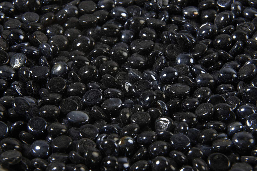 Onyx fire glass gems, glossy black oval crystals