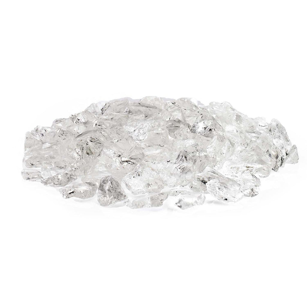 Recycled fire glass pile of ice-clear angular chunks with sparkling reflective facets