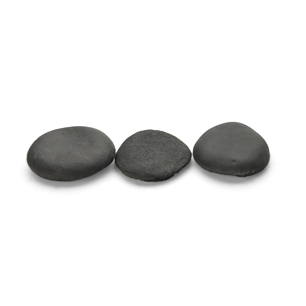 Black ceramic stones, three small flat ovals