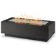 Black linear gas fire pit table with flames over decorative fire glass