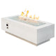 White linear gas fire pit table with flames, fire glass bed, and side control panel