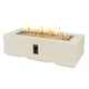 Cream linear gas fire pit table with open flame and recessed burner tray