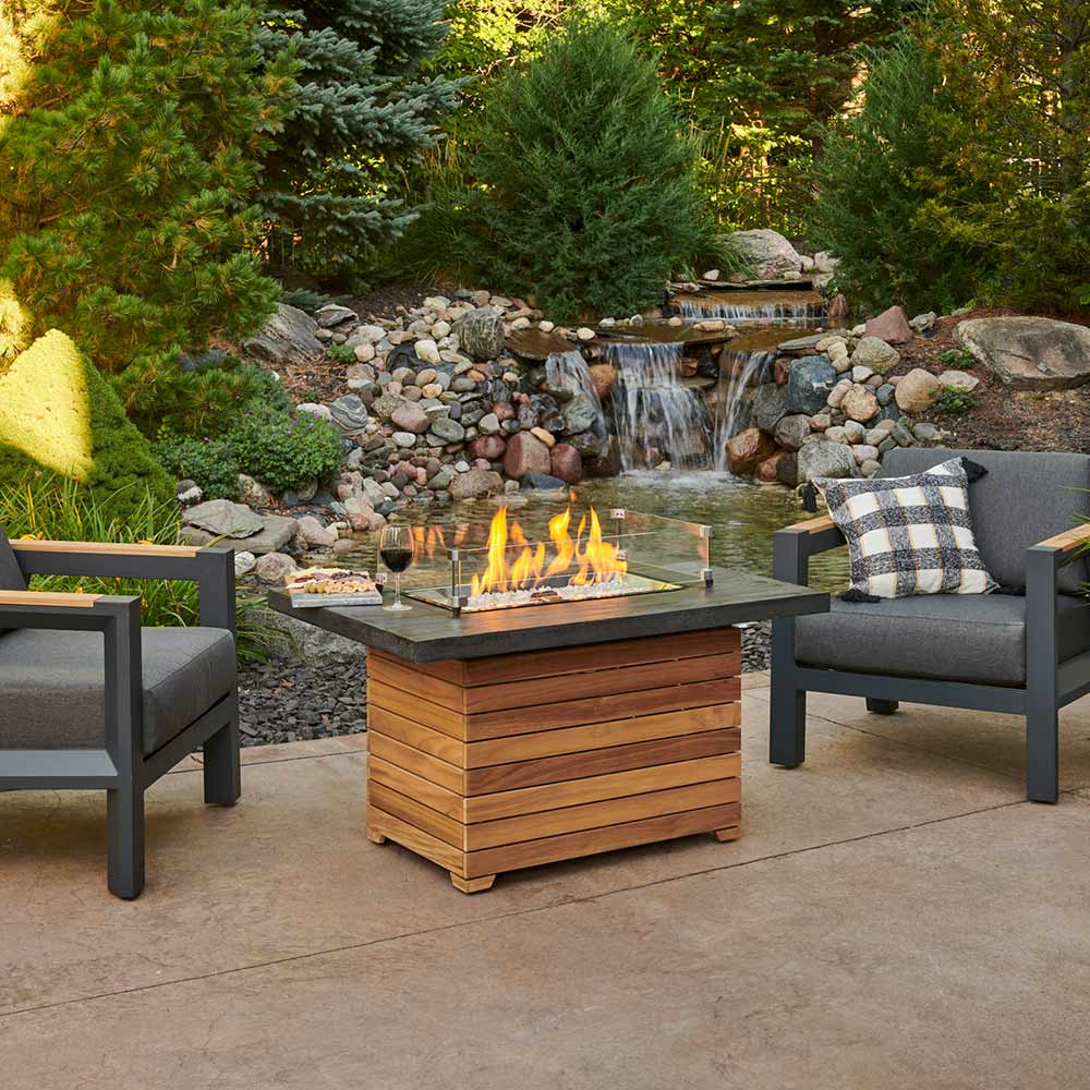 The Outdoor GreatRoom Company DAR-1224-EBG Darien Gas Fire Pit Table with Everblend Top and Teak Base, 44x30-Inch