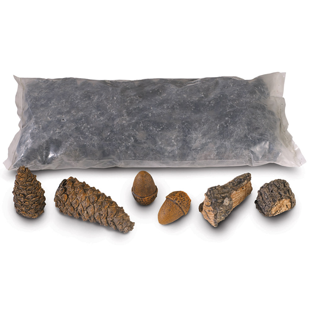 Fireplace decor set with dark coals, pine cones, acorns, and wood chips