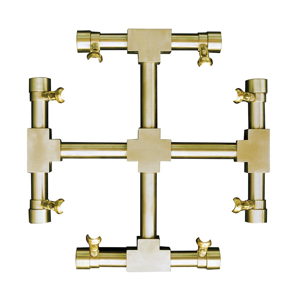 Brass gas fire pit burner manifold close-up with cross-shaped snowflake outlets
