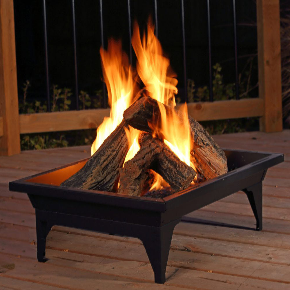 Rectangular propane fire pit with glowing flames burning in log pieces