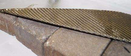 Basalt fabric insulation strip for fire deck edge
