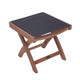 Teak sling footrest with black cushioned top and teak wood legs