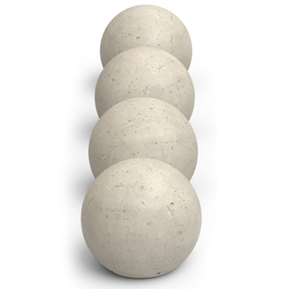 Light beige matte fire spheres stacked, speckled concrete texture
