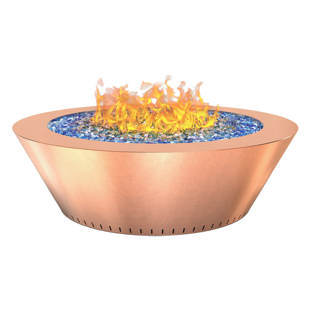 Round copper gas fire table with blue lava rocks and orange flames