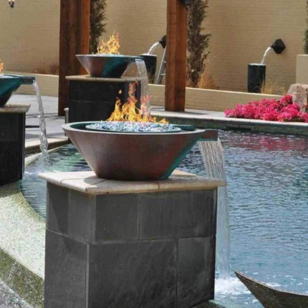 Copper fire and water bowl with flames centered over a blue pool
