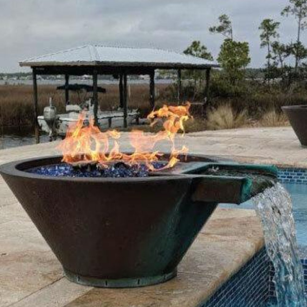 Hammered copper fire and water bowl with flames and water spillover