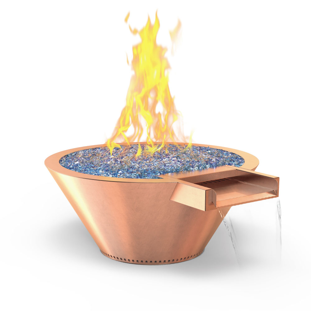 Copper round gas fire bowl with blue glass media and open flame