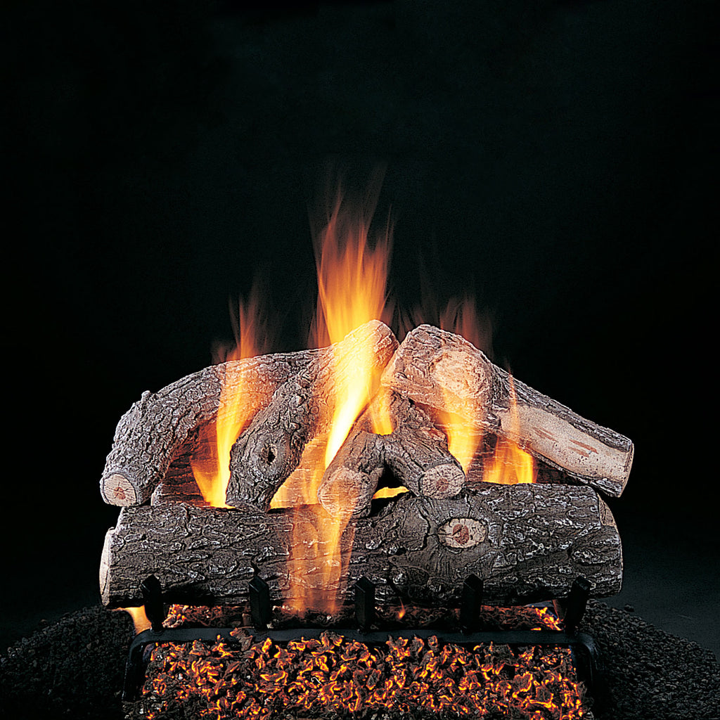 Frosted oak gas logs with visible flames and glowing embers