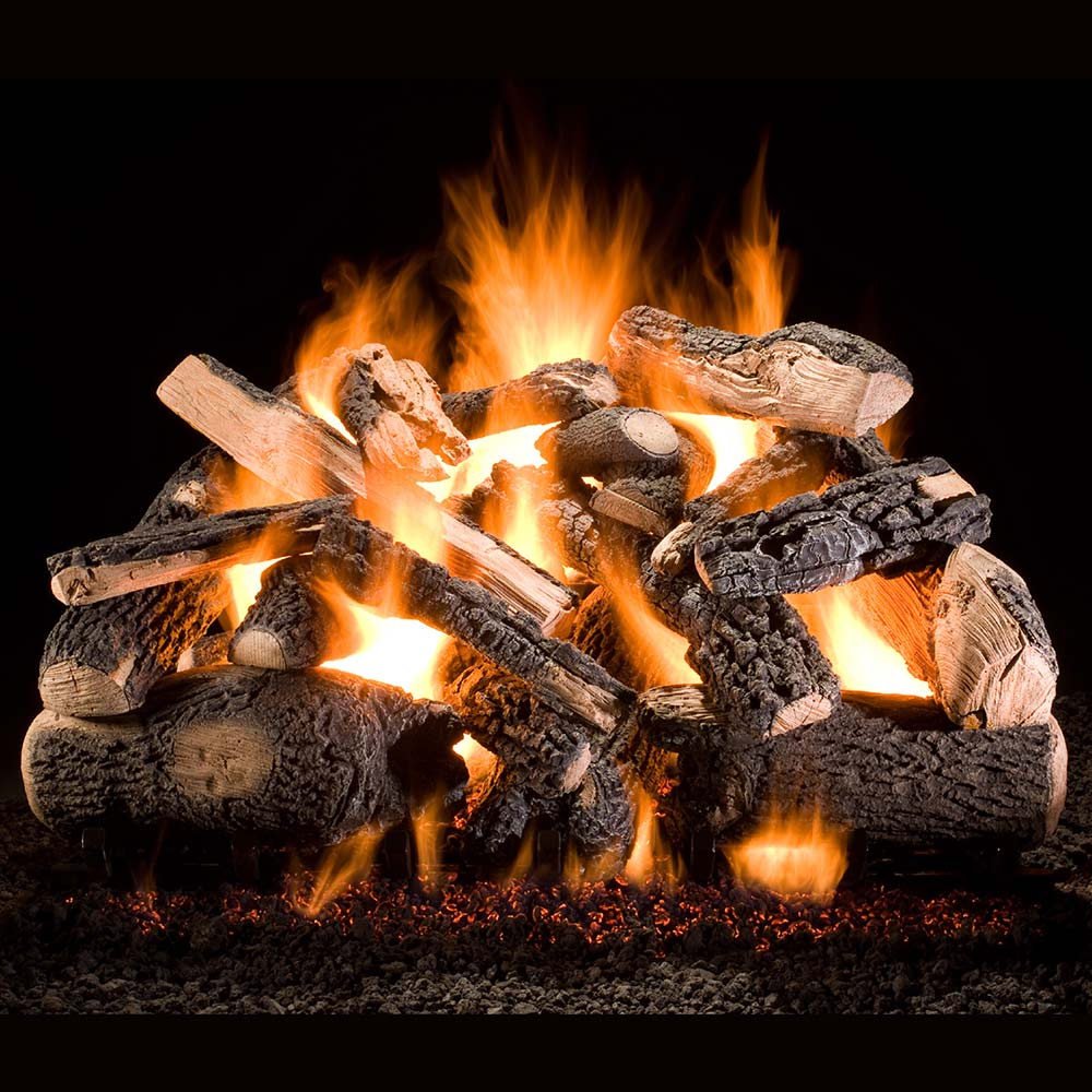 Stacked vented gas fireplace logs with visible flames and glowing embers