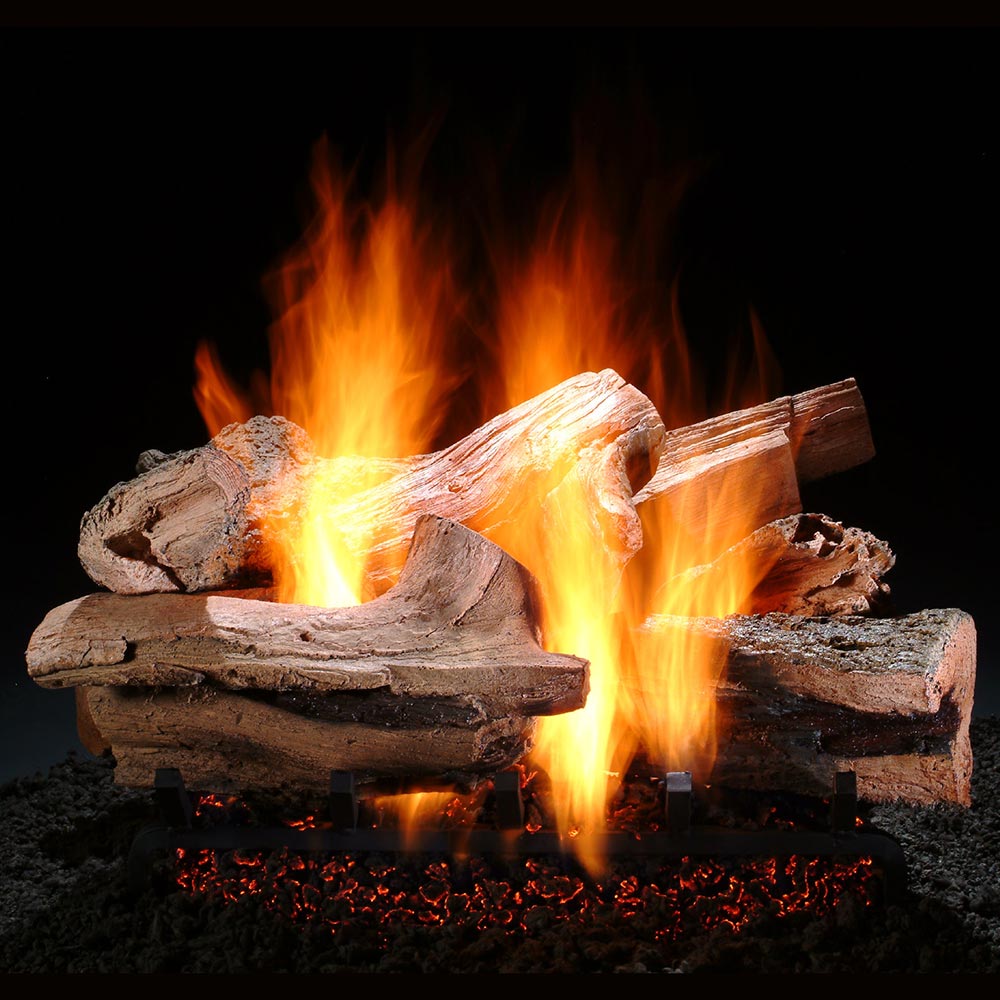 Vented gas log set with stacked wood logs and visible orange flames
