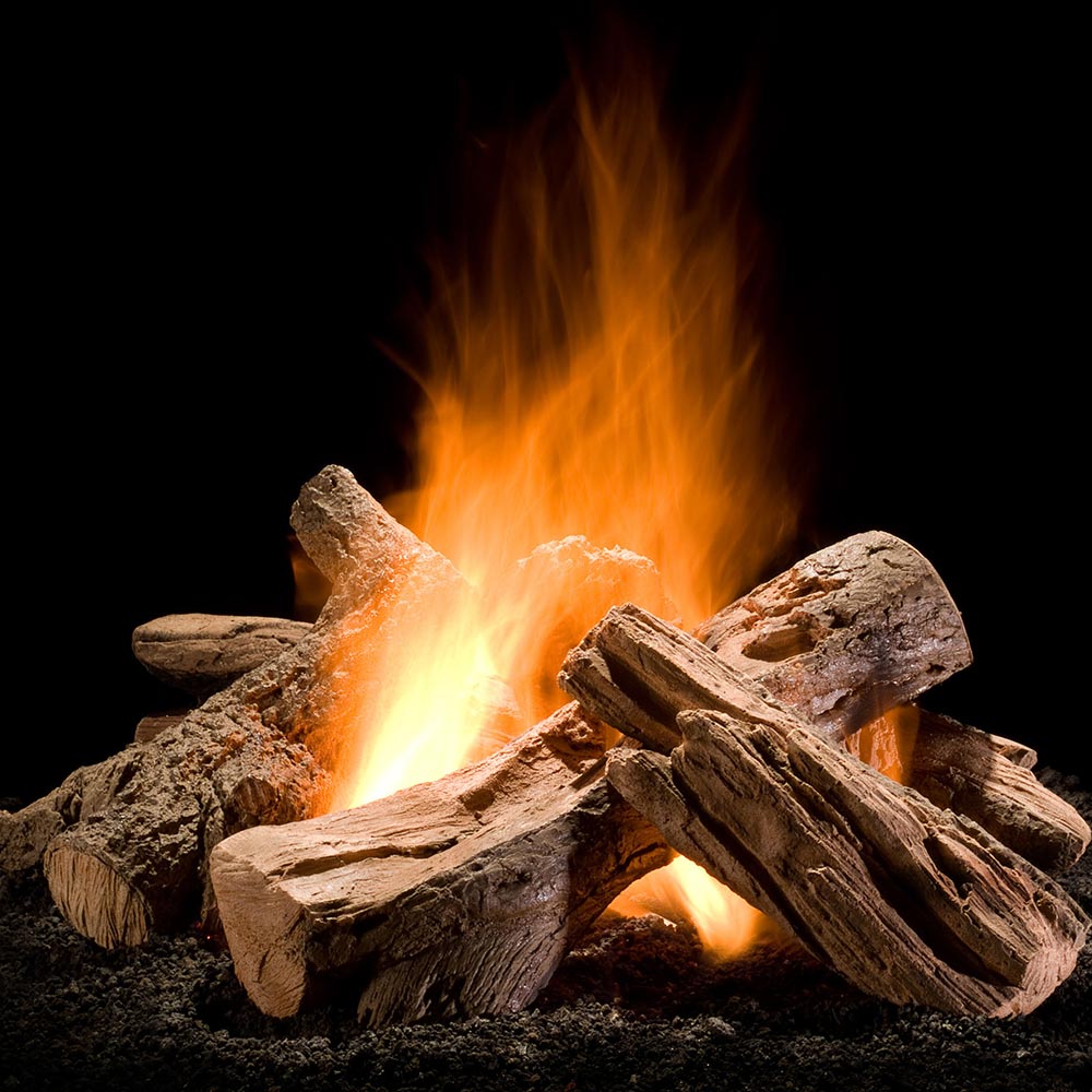 Split gas fire logs with visible flames and ember glow