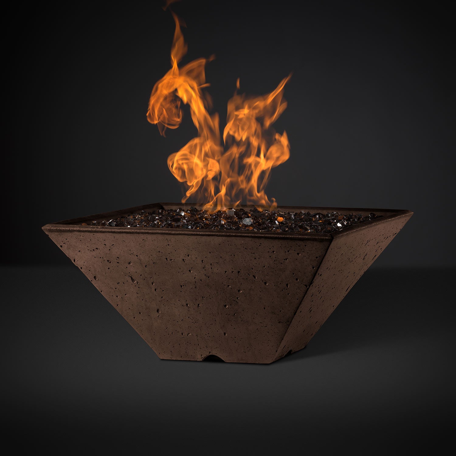 Square fire pit with rust-brown speckled finish and burning flames across the center