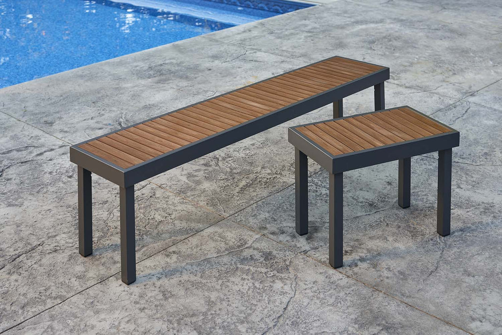 Outdoor patio bench with slatted wood top and dark metal legs, paired beside another