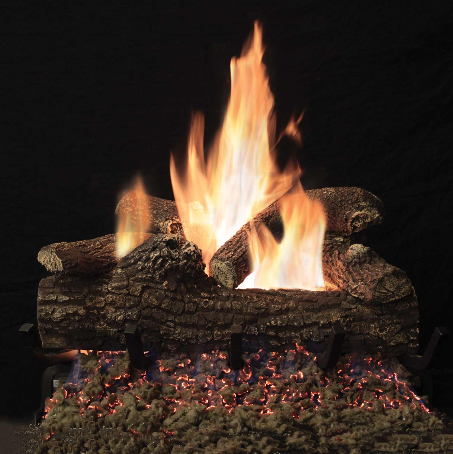 Refractory gas log set with burning flames and glowing embers