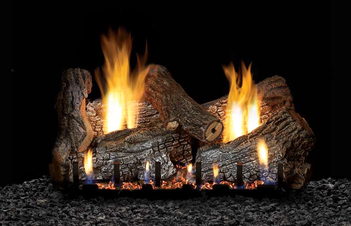 Refractory gas fireplace logs with visible flames and glowing embers