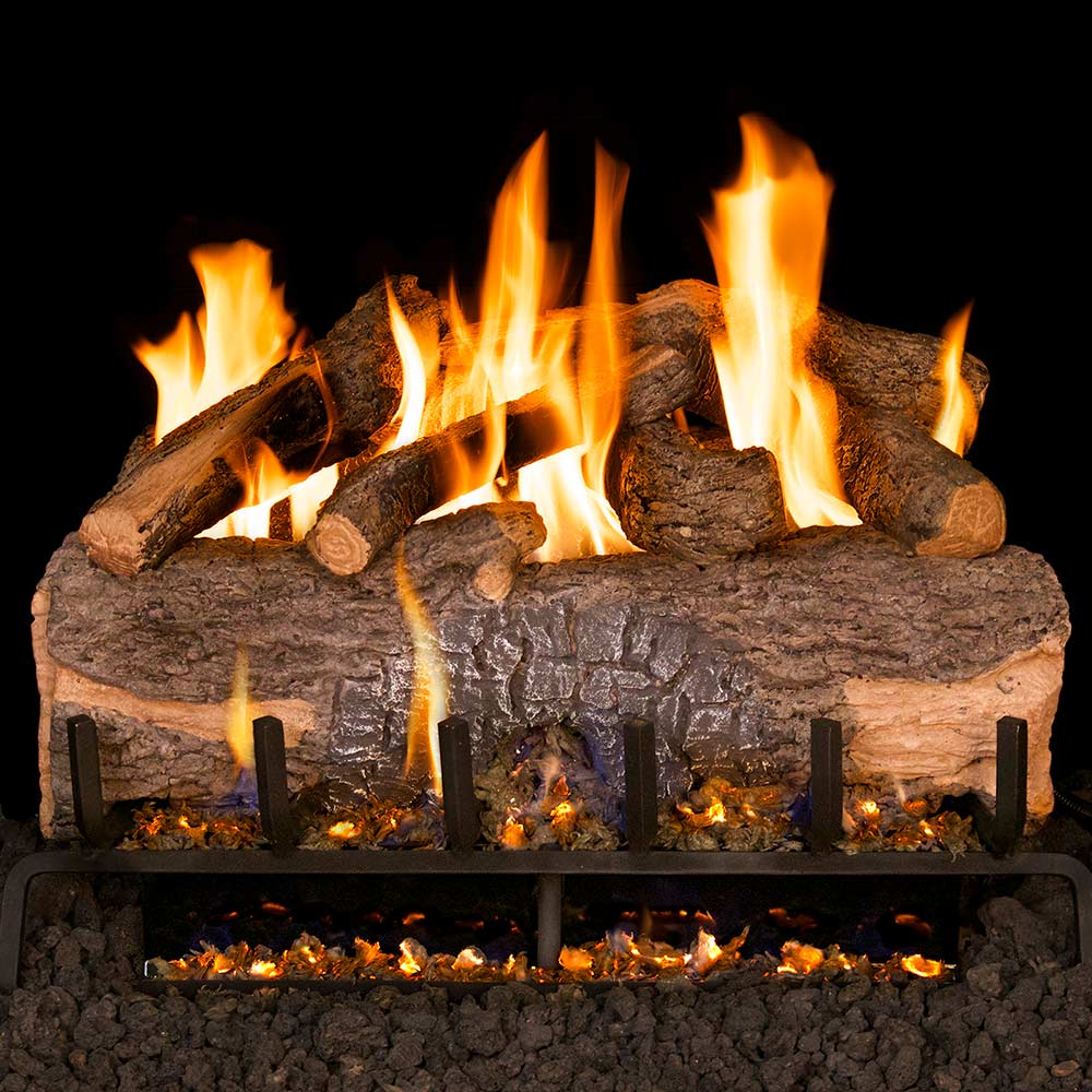 Real Fyre vented gas log set with glowing flames and oak-style logs in circular base
