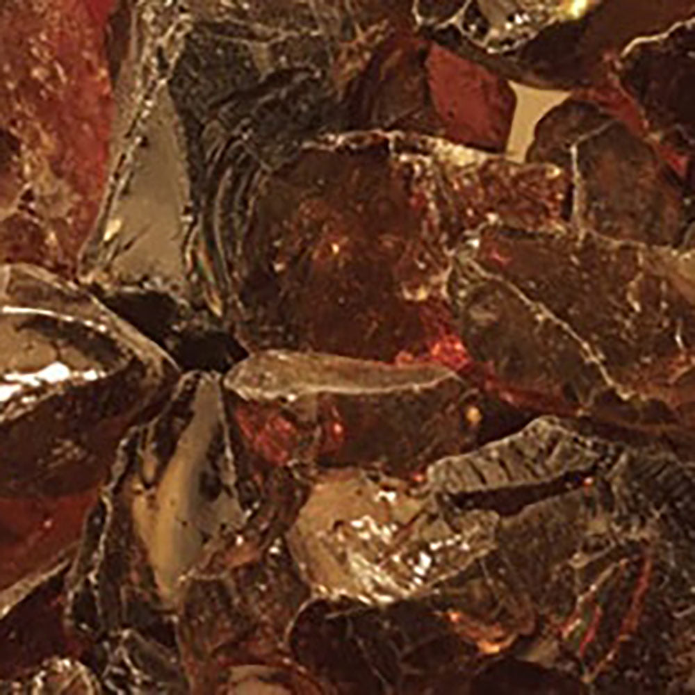 Amber fire glass stones with dark brown and gold highlights for outdoor fire pits