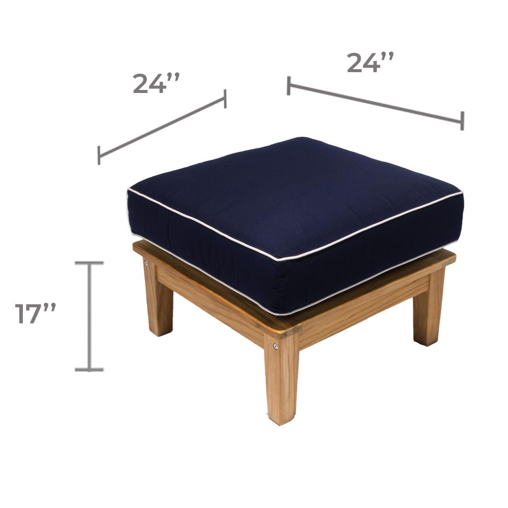 Teak ottoman with dark-navy cushion, measuring 24 in by 17 in