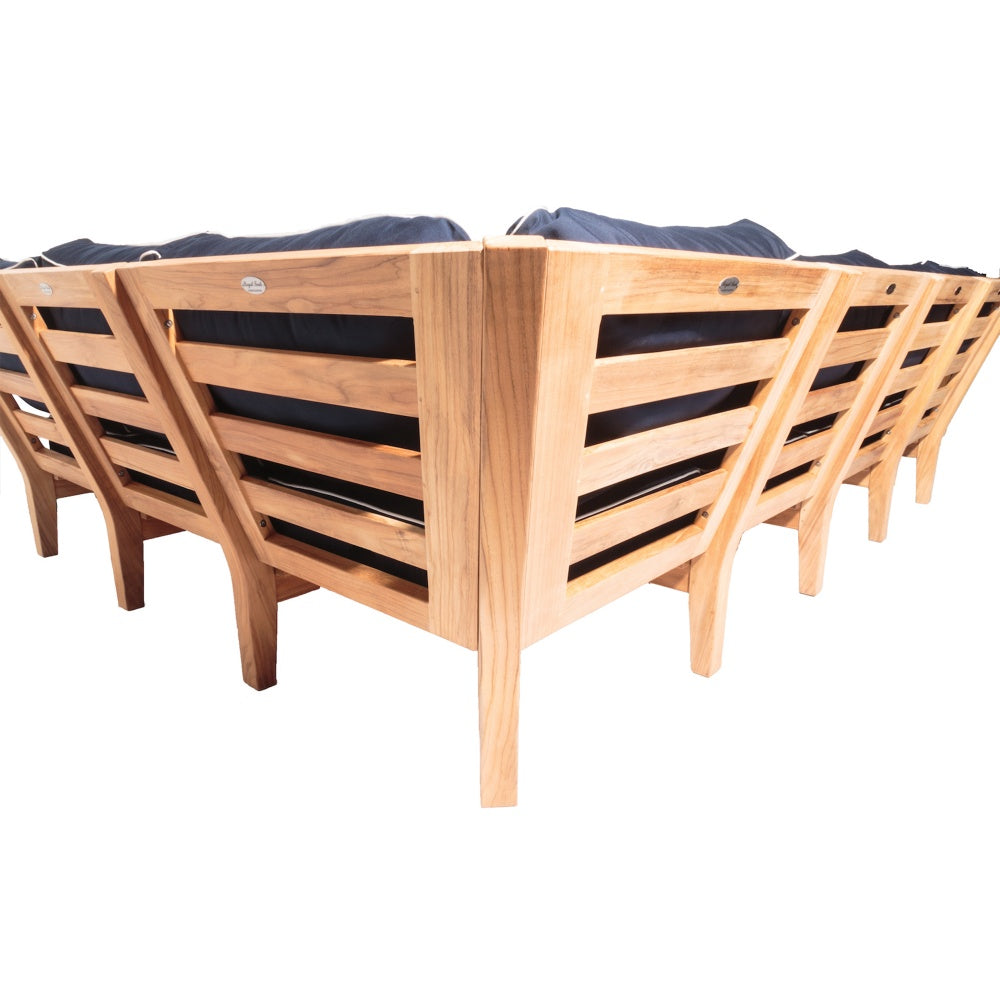 Small corner sectional sofa with light wood slatted back and blue seat cushions