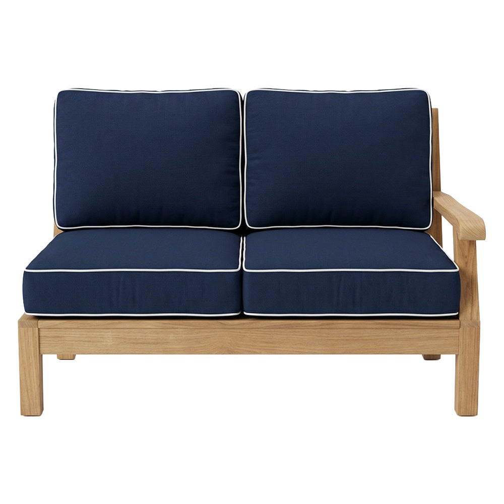 Right-arm facing loveseat with navy cushions, light wood frame, and piped trim