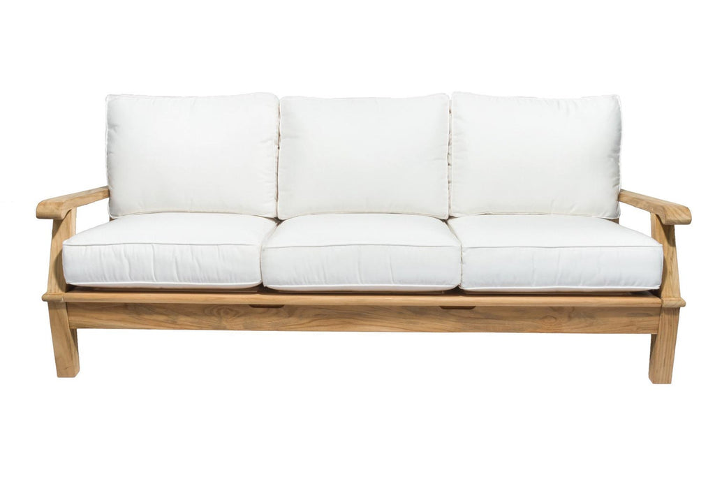 Miami sofa with white upholstered seat and back cushions on teak frame