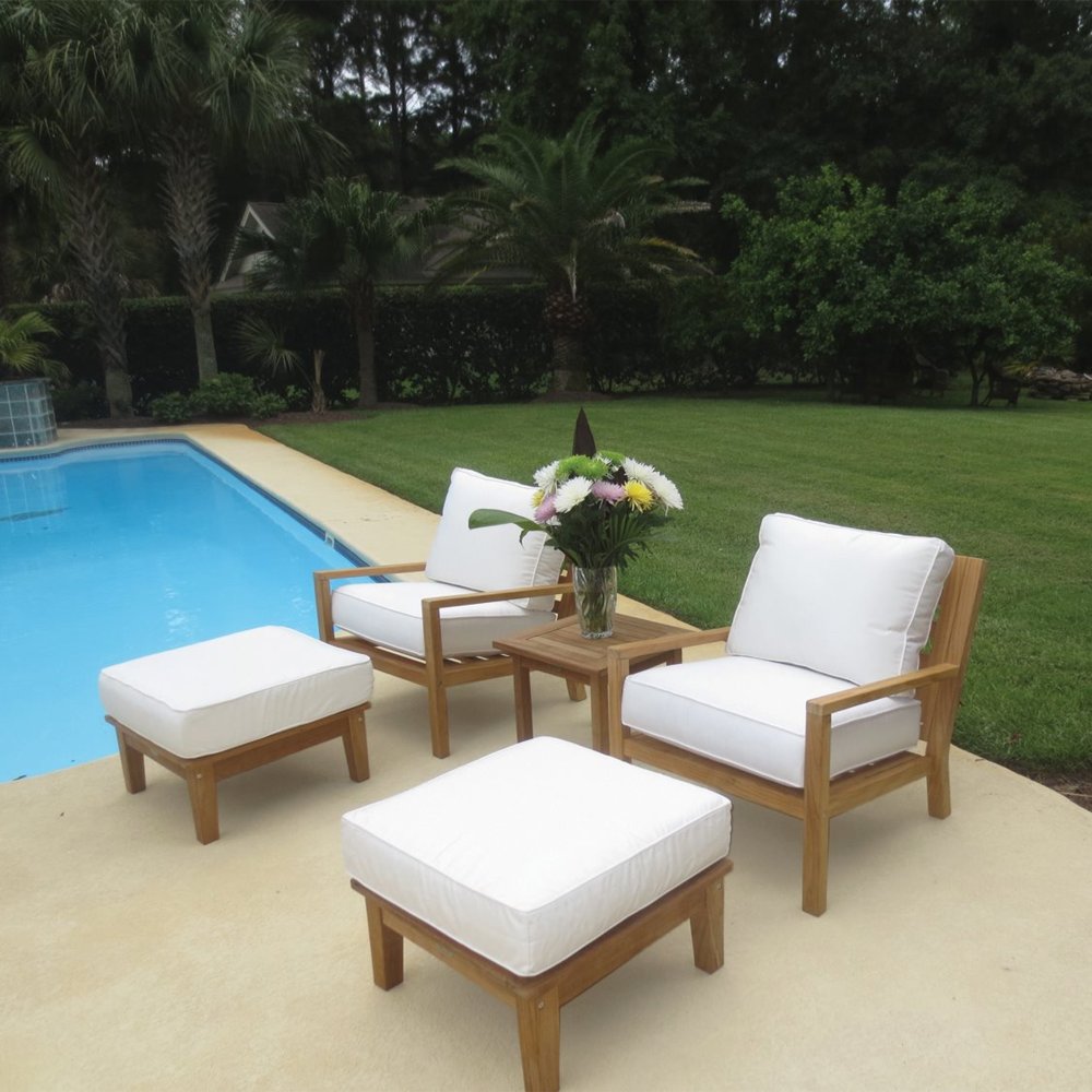 Teak outdoor ottoman with white cushion and square seat on wooden legs