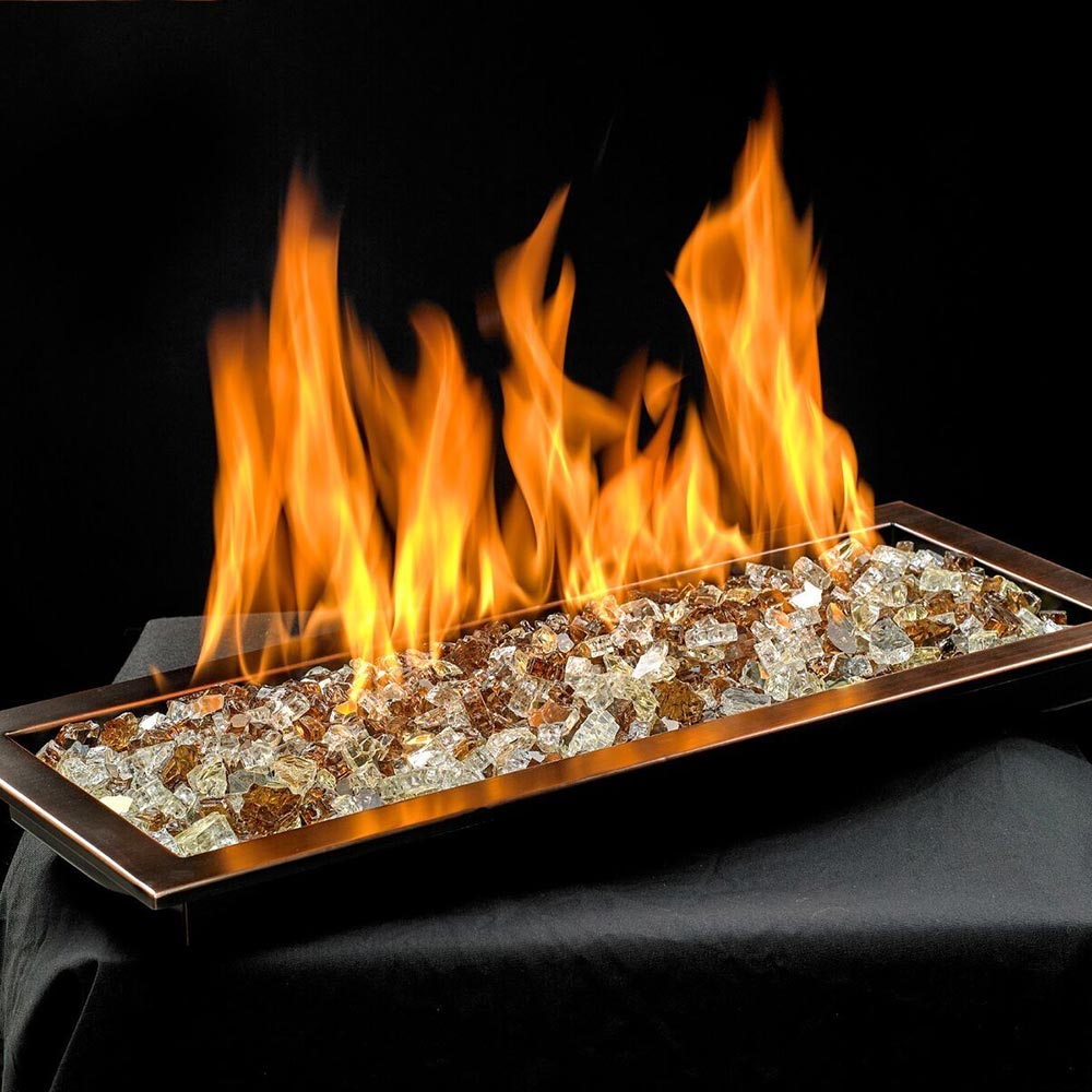 Fire pit burner tray with blue glass bed and tall orange flames