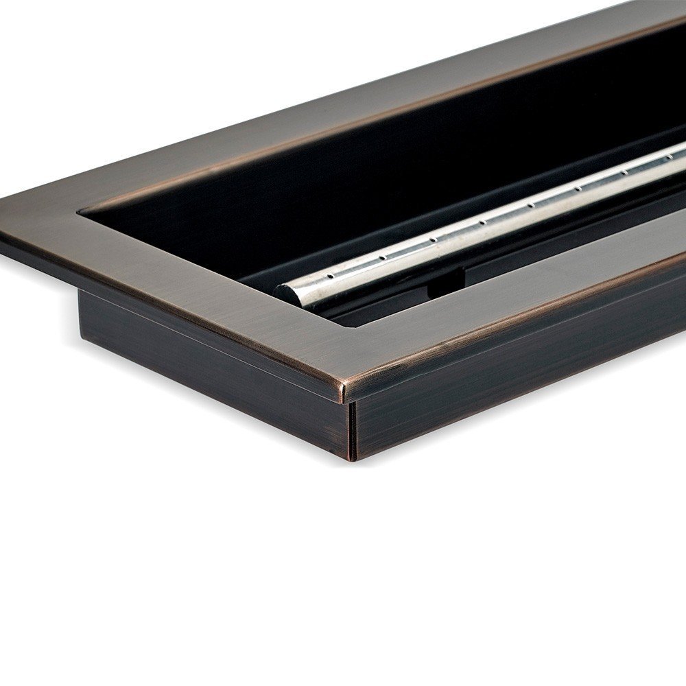 Linear fire glass burner pan with oil-rubbed bronze border and visible burner tube assembly