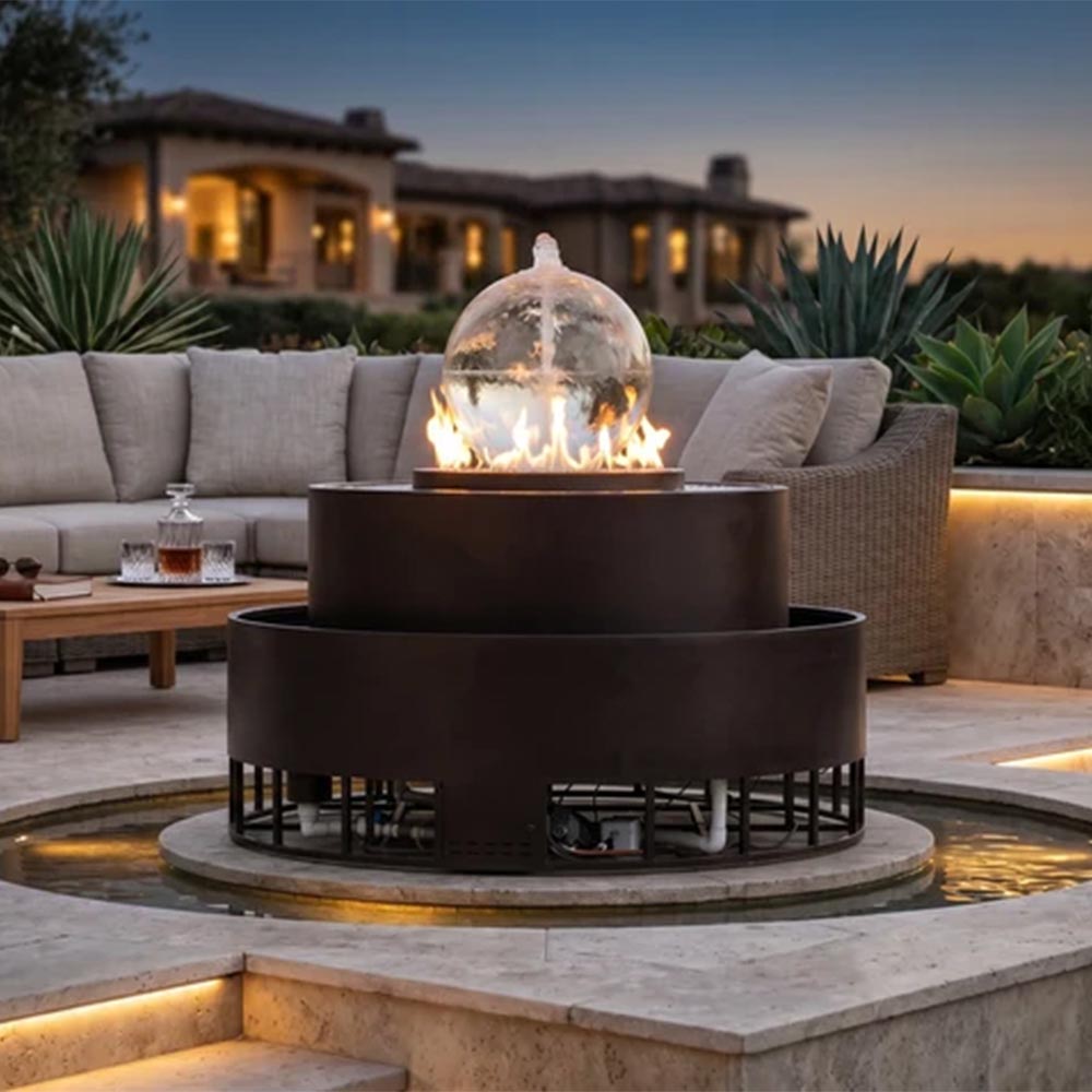 Outdoor gas fire and water bowl with dark bronze burner and clear globe over flames