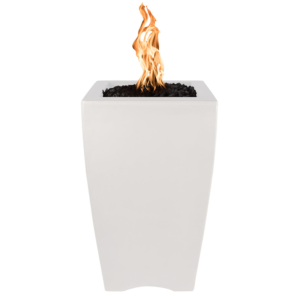 Concrete fire pillar with orange flame, white exterior, square tapered body