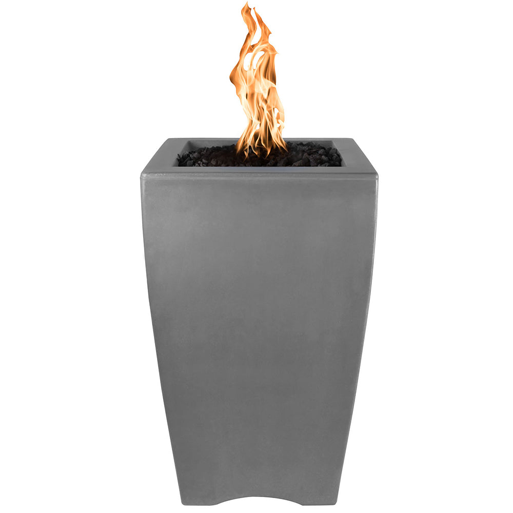 Concrete fire pillar with orange flame, light gray exterior, square tapered body