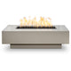 Light silver rectangular gas fire pit with recessed burner opening and flames